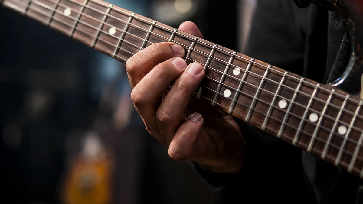 How to Hold a Guitar Correctly example image How to Hold a Guitar Correctly example image